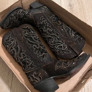 Brown and black snip toe boots